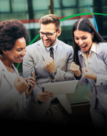 banner showing employees celebrating success while looking at a tablet screen