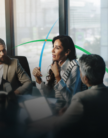 banner showing business executives having a discussion in a conference room