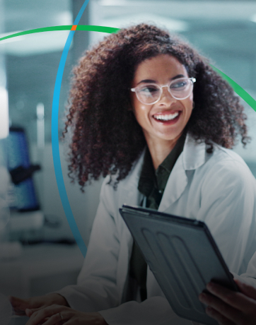 banner showing two pharma professionals in a lab having a discussion while looking at a tablet screen