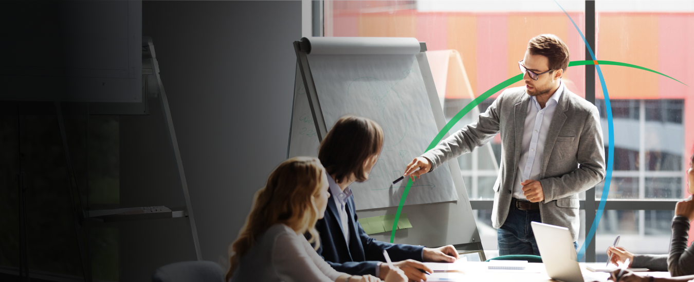 banner showing a man delivering a presentation in a conference room